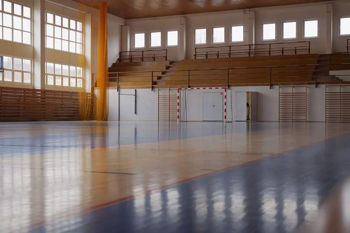 An empty school gymnasium.