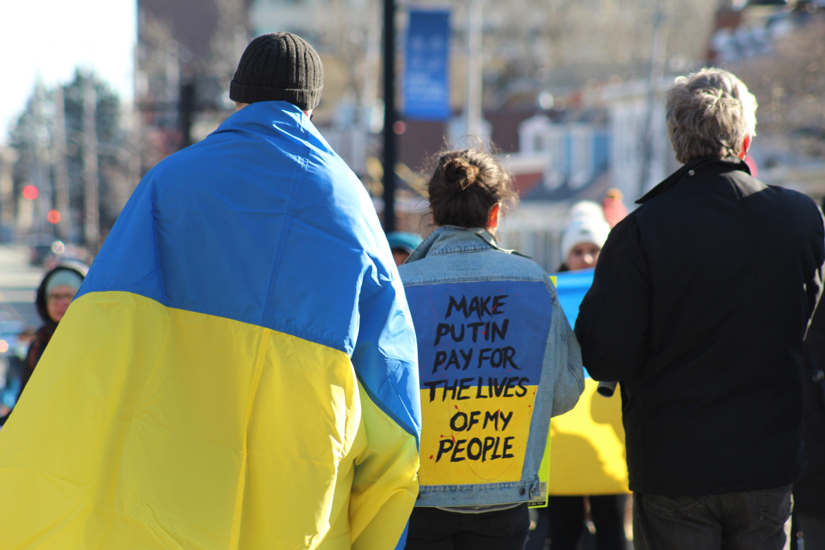 Several who attended the rally say they want to see stricter sanctions against Russia.