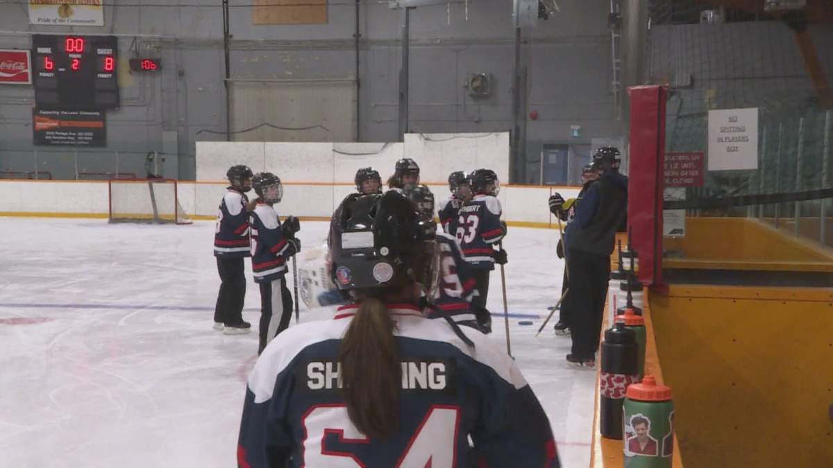 Buchanan giving her team a pep talk in between drills at Eric Coy arena.