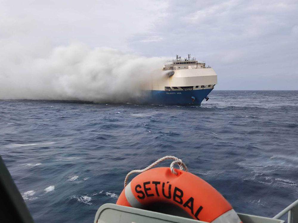 A close-up photo of the Felicity Ace burning in the middle of the sea.