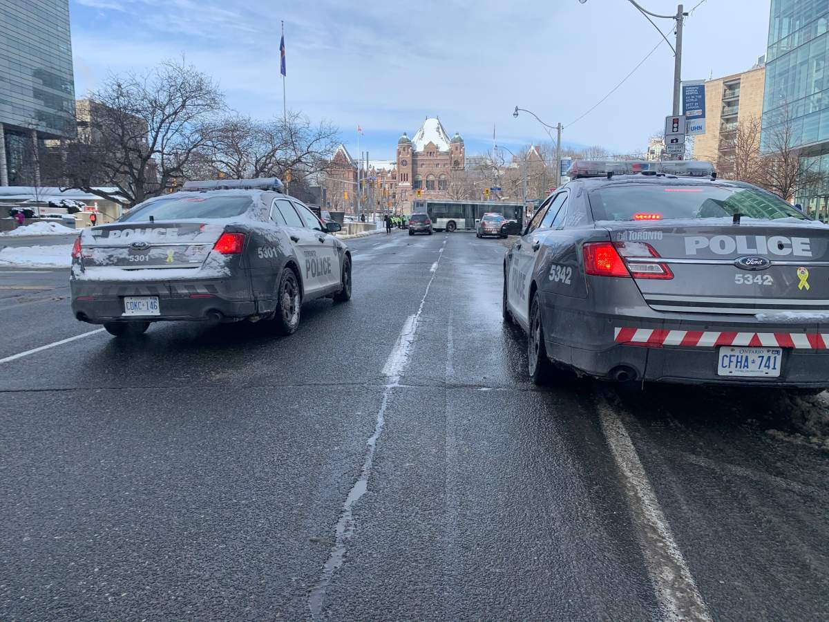 Toronto police close off roads near Queen’s Park on Feb. 4, 2022.