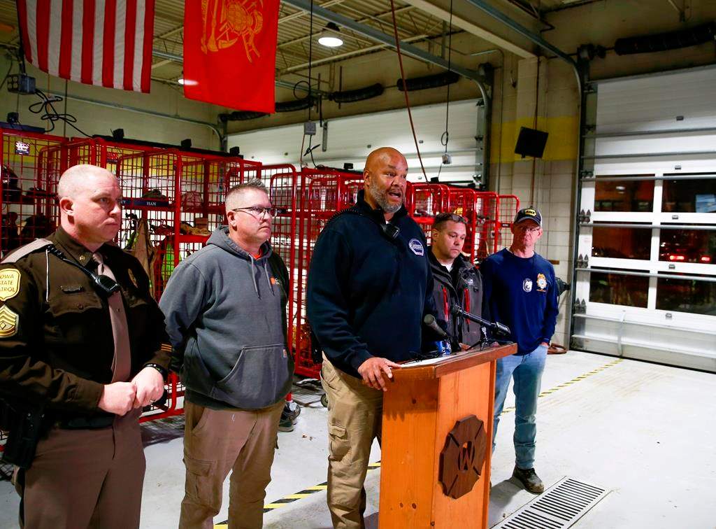 Diogenes Ayala, director of the Madison County Emergency Management Agency, reports on the number of fatalities after a tornado touched down southwest of Winterset, Iowa, on Saturday, March 5, 2022, damaging homes, knocking down trees and toppling power lines.