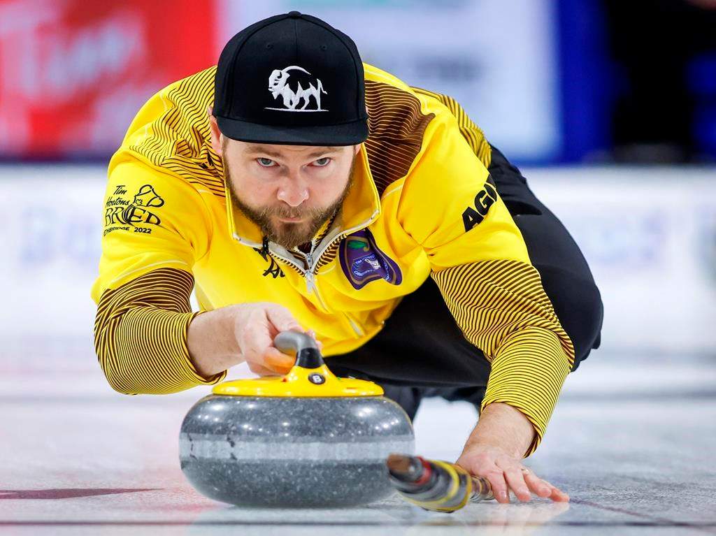 Team Manitoba skip Mike McEwen makes a shot against Team British Columbia at the Tim Hortons Brier in Lethbridge, Alta., Saturday, March 5, 2022.