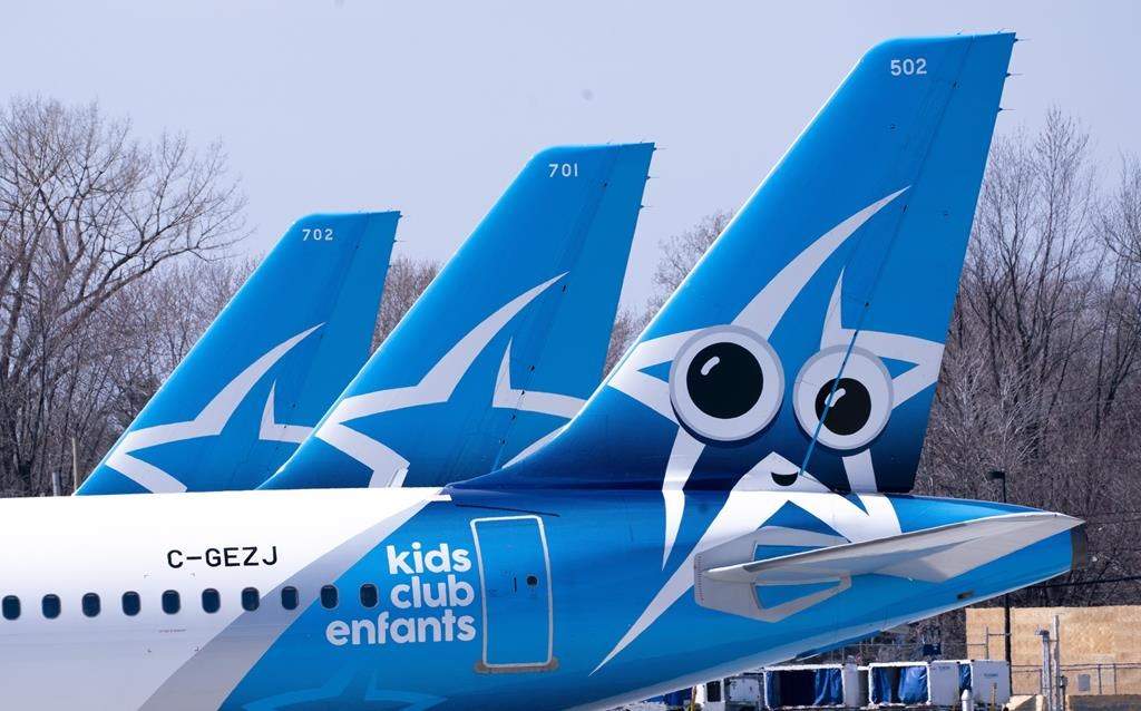 Air Transat aircraft are seen on the tarmac at Montreal-Trudeau International Airport in Montreal, on Wednesday, April 8, 2020. 