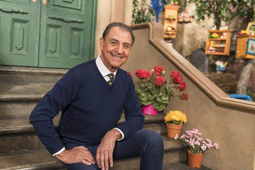 In this photo provided by Sesame Workshop, Emilio Delgado poses for a picture at Kaufman Astoria Studios while filming the 50th season of "Sesame Street," in October 2018.