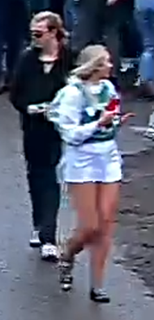 Police are searching for a woman who walked away with a magazine full of ammunition dropped by police on Saturday in the university district.