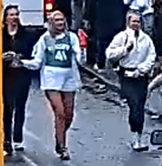 The woman, pictured, is described as blond and was wearing a white jacket and skirt as well as a green shirt with 41 on the front.