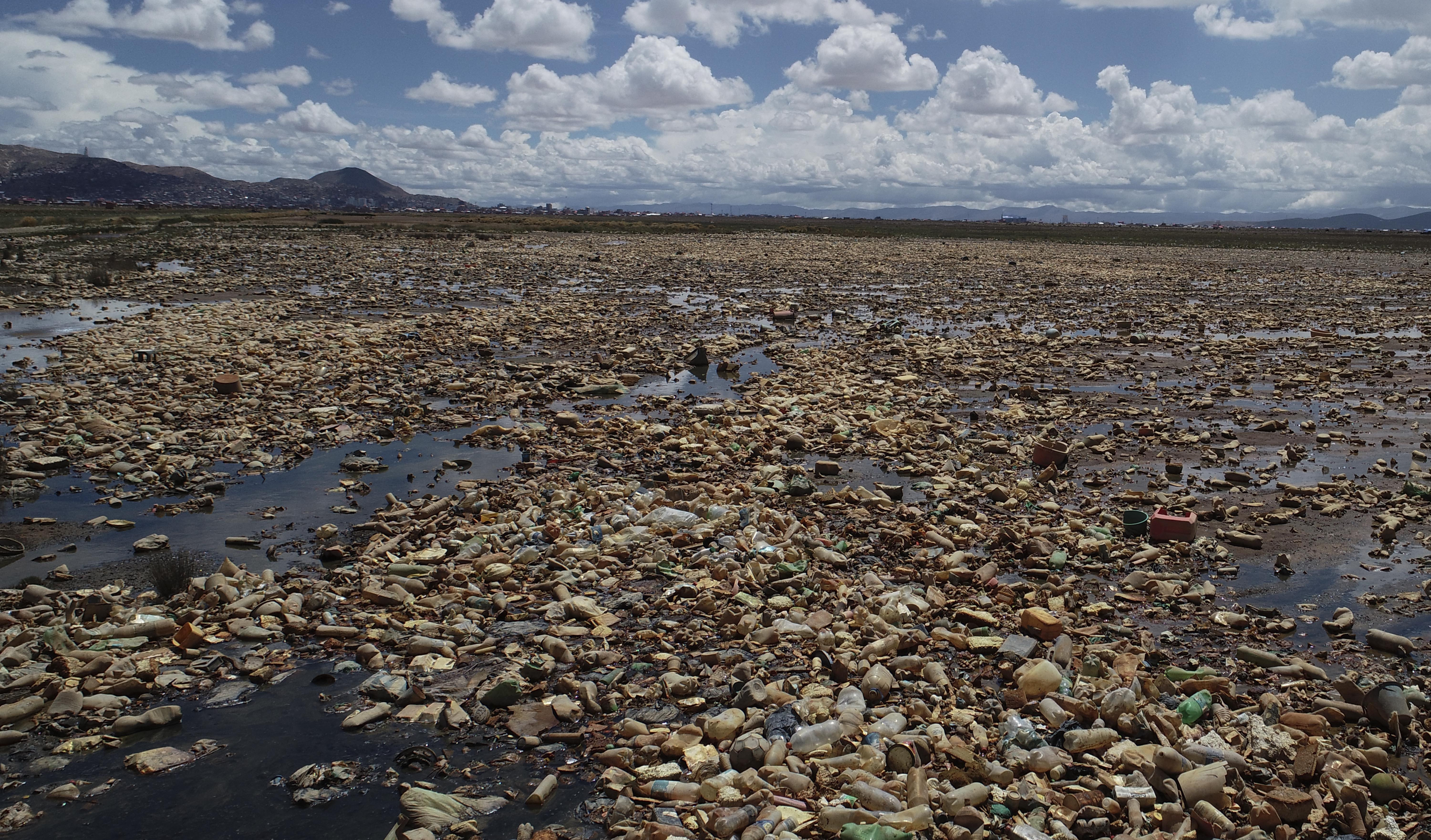 Plastic bottles and other garbage float in Uru Uru Lake near Oruro, Bolivia, Thursday, March 25, 2021.