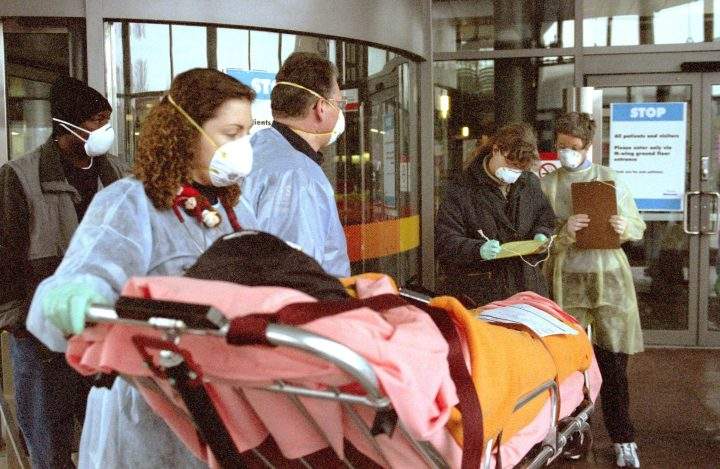 STOCK-Toronto,April,2003. Patient arriving and getting processed at Sunnybrook and Womens College Healt Science Centre during a SARS ALERT.