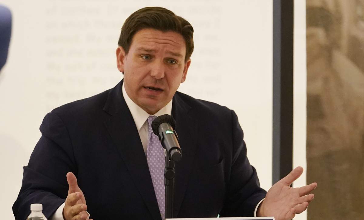 Florida Gov. Ron DeSantis speaks at a news conference, Monday, Feb. 7, 2022, in Miami. (AP Photo/Marta Lavandier).