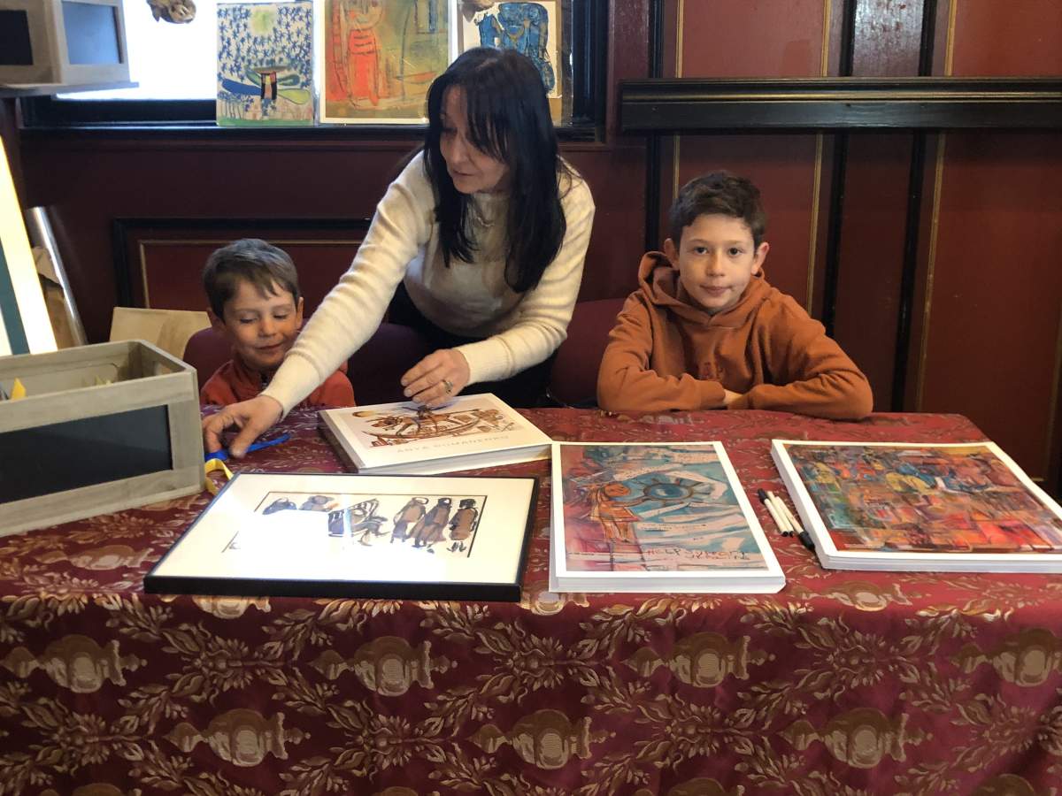 Toronto artist Anya Romanenko with two of her nephews Stephan Sirko, 5 and Michael Sirko, 11 who fled the war in Ukraine. March 24, 2022