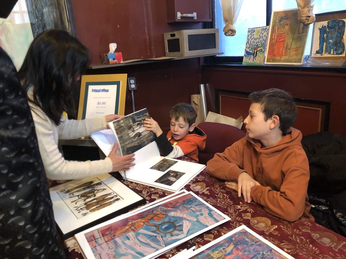 Toronto artist Anya Romanenko with two of her nephews Stephan Sirko, 5 and Michael Sirko, 11 who fled the war in Ukraine. March 24, 2022