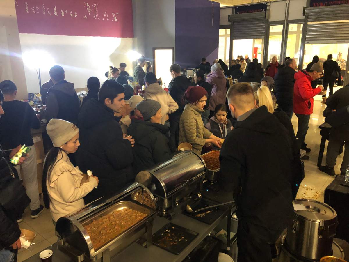 Refugees in the queue at the cafeteria in the Korczowa refugee centre in Poland, March 3, 2022.