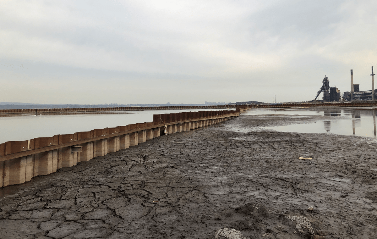 Tens of thousands of cubic square metres of contaminated sediment has been dredged from the Hamilton Harbour and contained in a massive double-walled facility built on the port.
