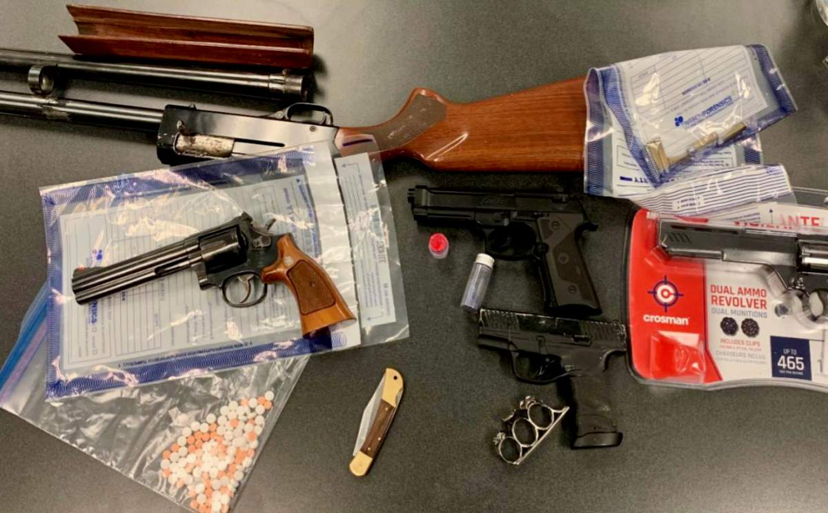Police in Lindsay seized firearms and a quantity of fentanyl during a search of a residence on March 24, 2022.