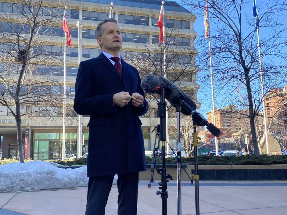 Federal Labour Minister Seamus O'Regan addresses reporters on March 21, 2022, in Calgary, Alta.