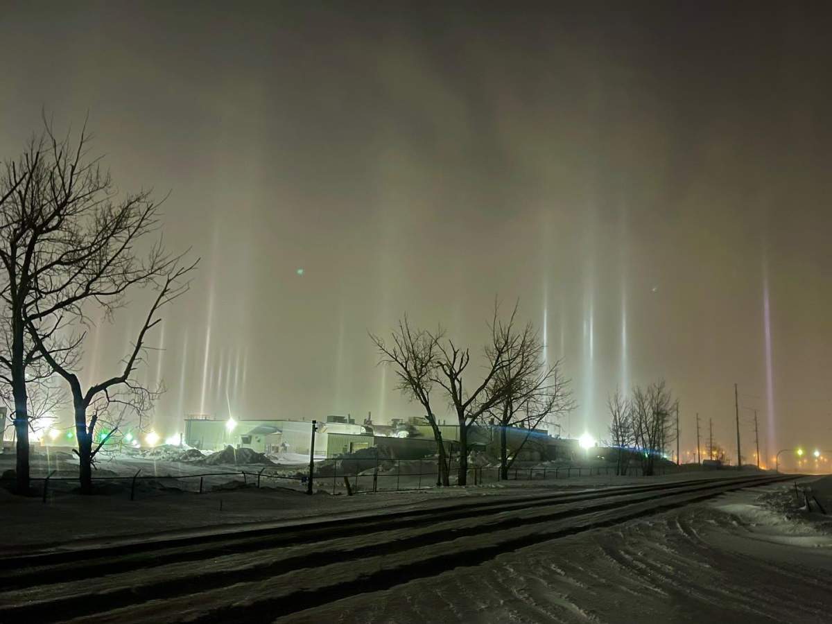 Regina residents treated to special weather phenomenon known as light pillars - image