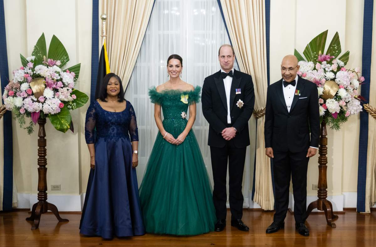 Patricia Allen, Catherine, Duchess of Cambridge, Prince William, Duke of Cambridge and Governor General of Jamaica Sir Patrick Allen pose during a dinner reception at King's House on March 23, 2022 in Kingston, Jamaica.