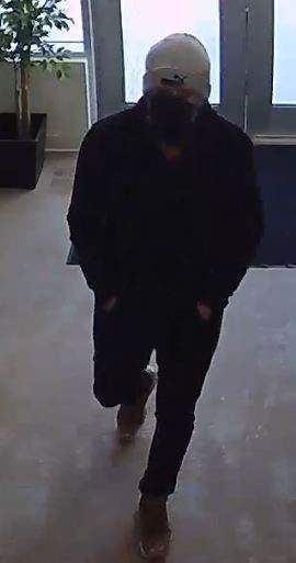 Edmonton police are looking for the public's help identifying a suspect in an armed robbery at a pharmacy in the Chappelle neighbourhood on Monday, Feb. 21.
