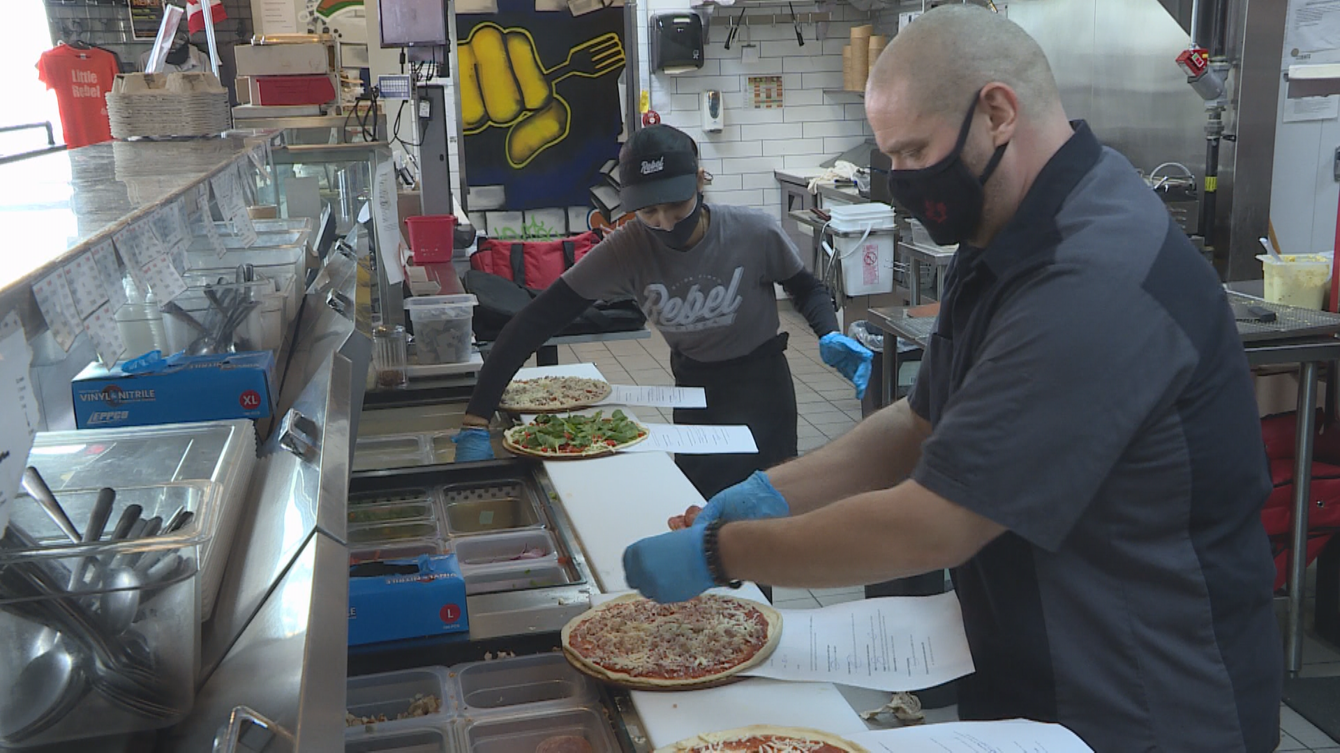 Chris Stoneham, co-owner of Rebel Pizza and StrEATS Southdale Kitchen in Winnipeg, says his staff compliment is short about 75 per cent.
