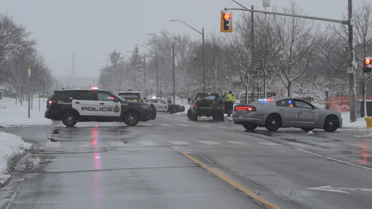 Hamilton police on scene Dec. 1, 2020 where 11-year-old Jude Strickland was hit by a vehicle while walking home from school.