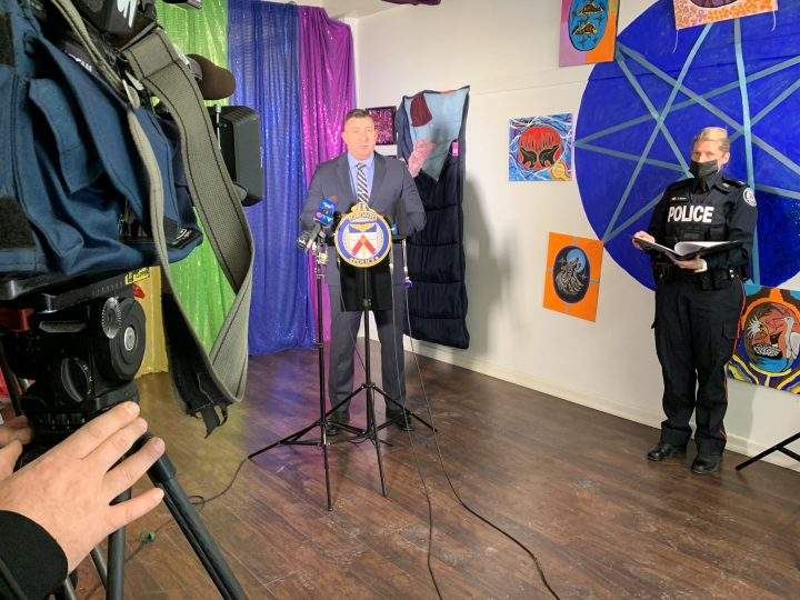 Toronto police Detective Jason Contant speaks at a press conference