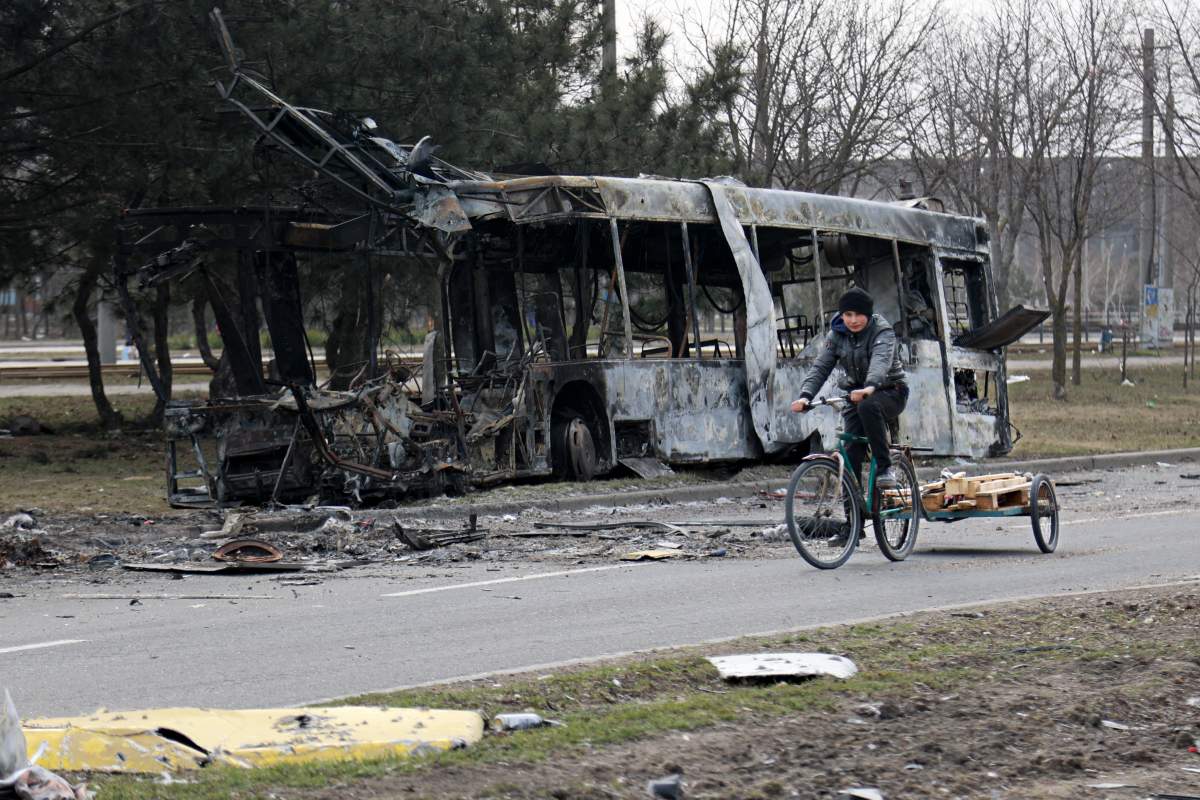 Person riding bike outside Mariupol