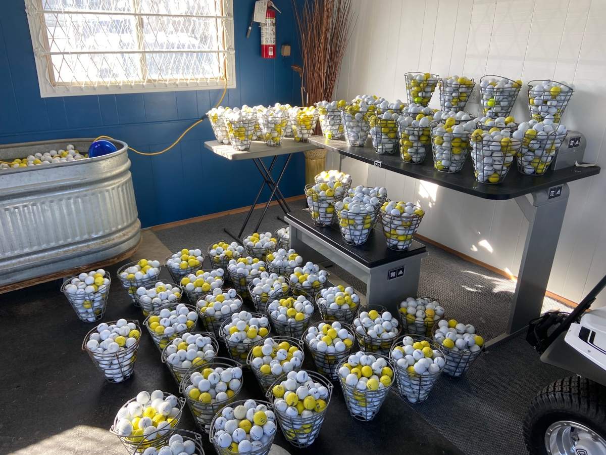 Buckets of golf balls prepared at the Canada Golf Card Driving Range and Mini Golf in southwest Edmonton Friday, March 18, 2022.