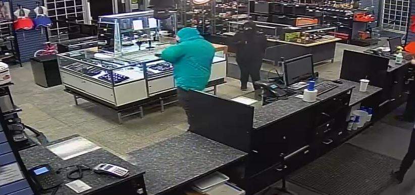 Edmonton police are hoping to identify a man and woman responsible for an armed robbery at a pawn shop in the area of 126 Avenue and Fort Road on Monday, Jan. 24, 2022.