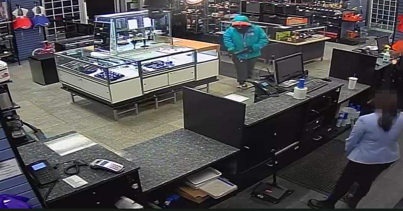 Edmonton police are hoping to identify a man and woman responsible for an armed robbery at a pawn shop in the area of 126 Avenue and Fort Road on Monday, Jan. 24, 2022.