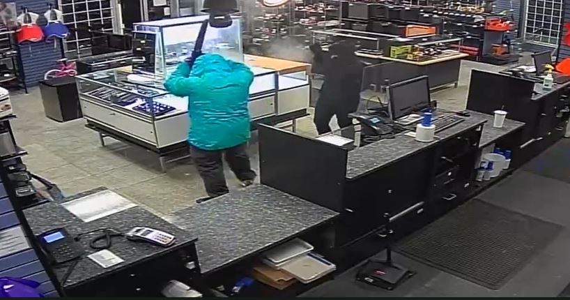 Edmonton police are hoping to identify a man and woman responsible for an armed robbery at a pawn shop in the area of 126 Avenue and Fort Road on Monday, Jan. 24, 2022.