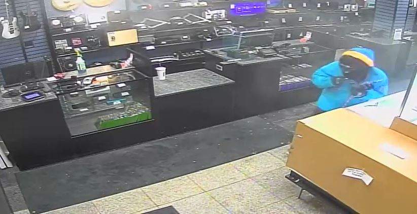 Edmonton police are hoping to identify a man and woman responsible for an armed robbery at a pawn shop in the area of 126 Avenue and Fort Road on Monday, Jan. 24, 2022.