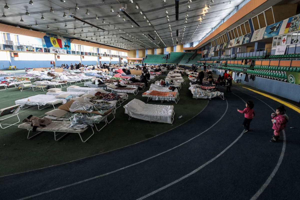 An athletics complex in Chisinau where Ukrainian refugees of Roma ethnicity are being housed. (Photo by GIL COHEN-MAGEN / AFP)