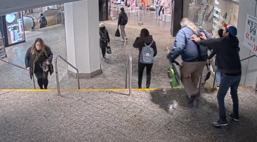 Vancouver police have arrested a man accused of shoving a 61-year-old down the stairs at a Vancouver SkyTrain station.