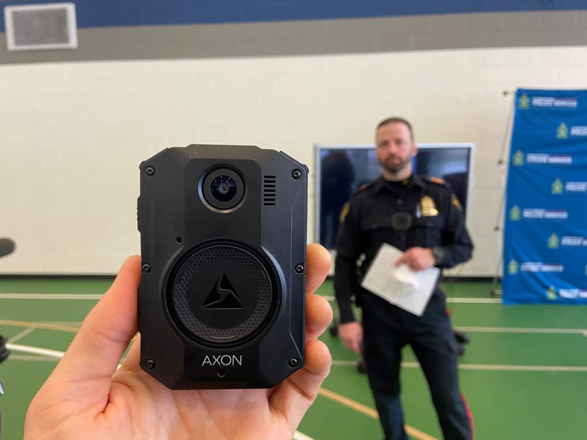 One of the cameras the Saskatoon Police Service will begin using in a trial program. Sgt. Tom Gresty, who is heading the program, stands in the background.