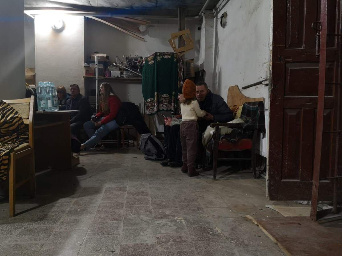 Ukrainians keep busy in the southwestern town of Kamianets-Podilskyi, where more than 10,000 refugees have fled since Russia's invasion began.