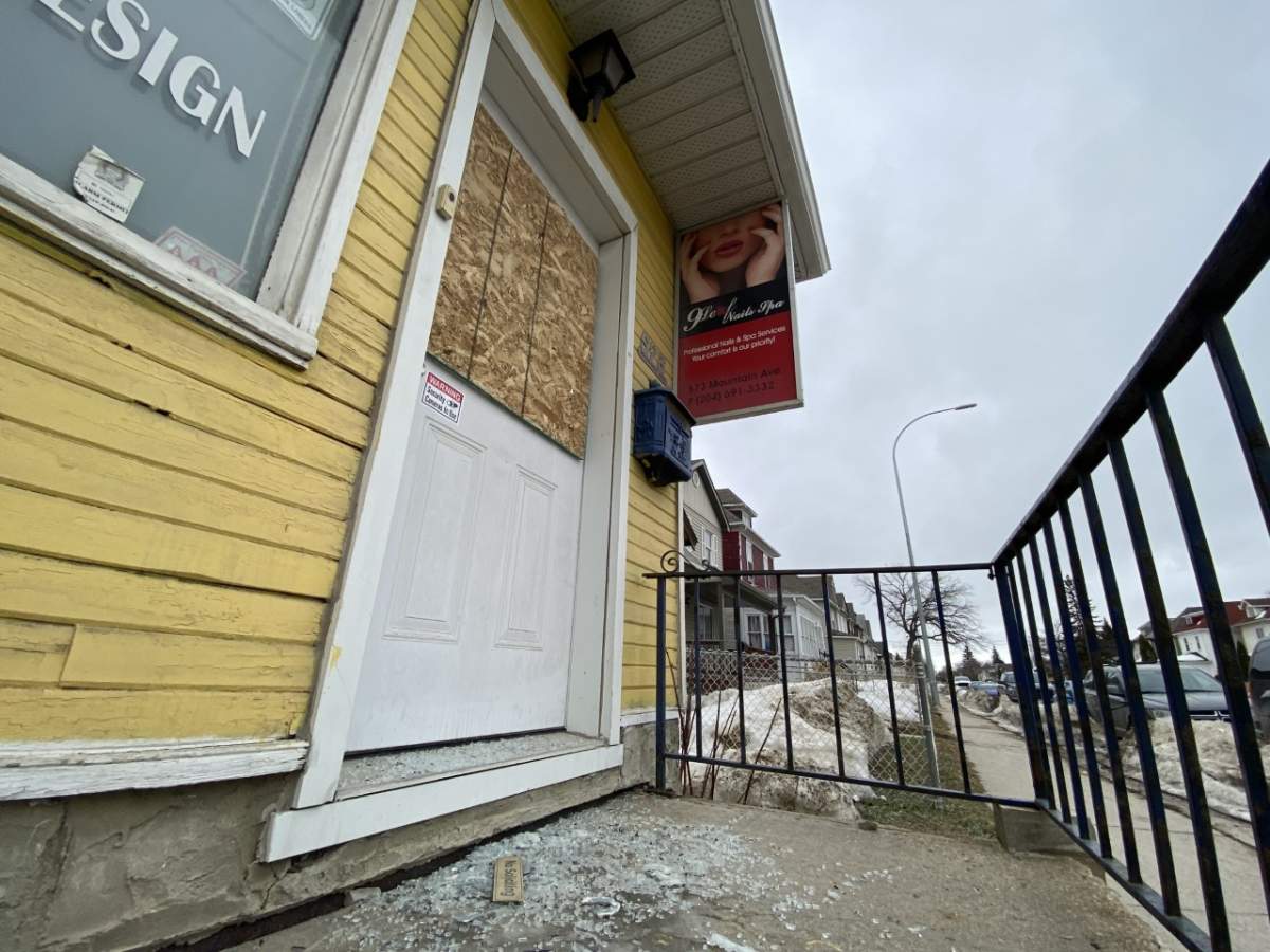 Broken glass covers the steps of 573 Mountain Avenue. The space is set to house families separated by the welfare system./Michelle Karlenzig