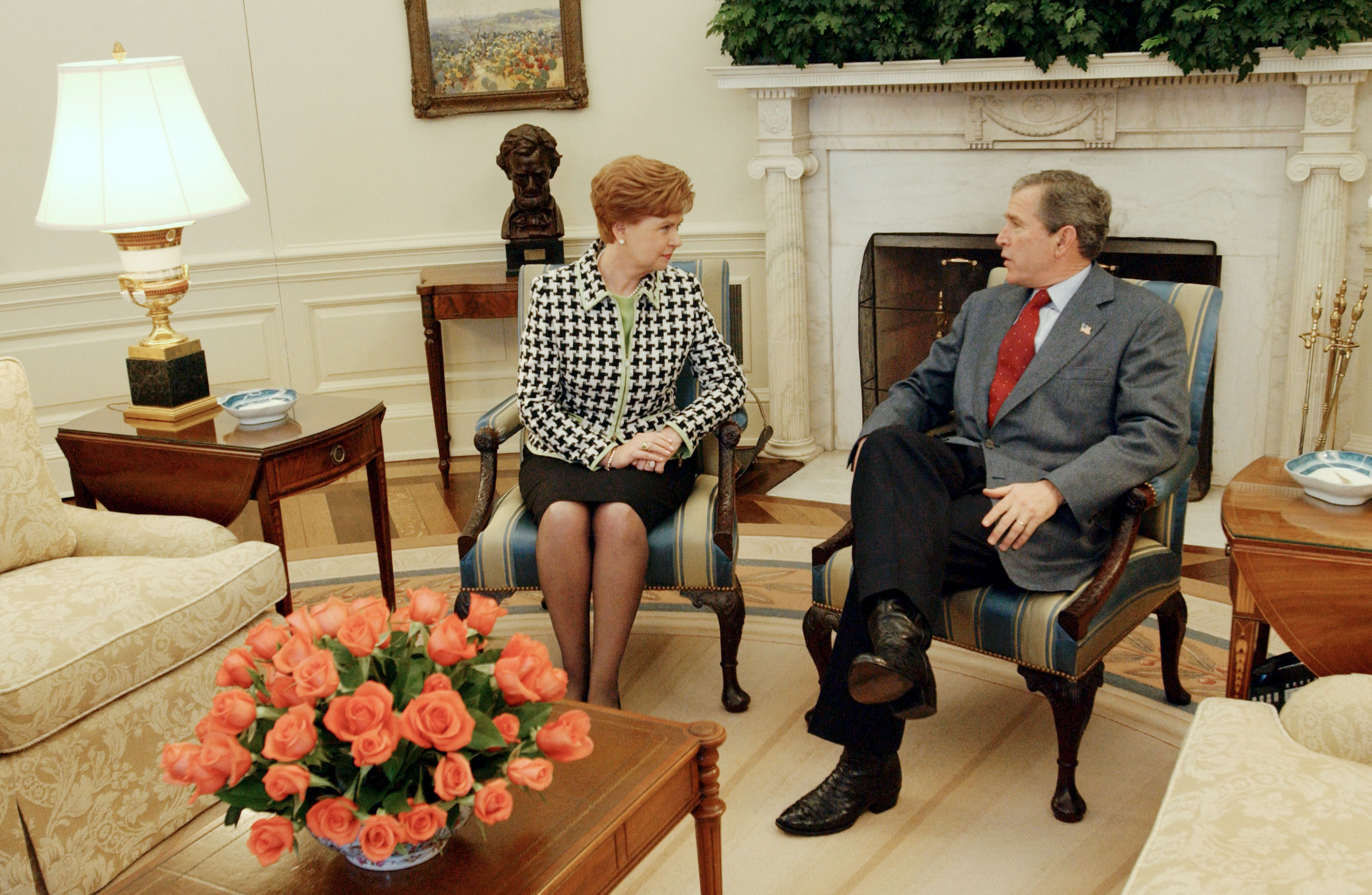 U.S. President George W. Bush talks with Latvian President Vaira Vike-Freiberga during a visit to the White House on February 17, 2003. (Photo by Tina Hager/White House/Getty Images)
