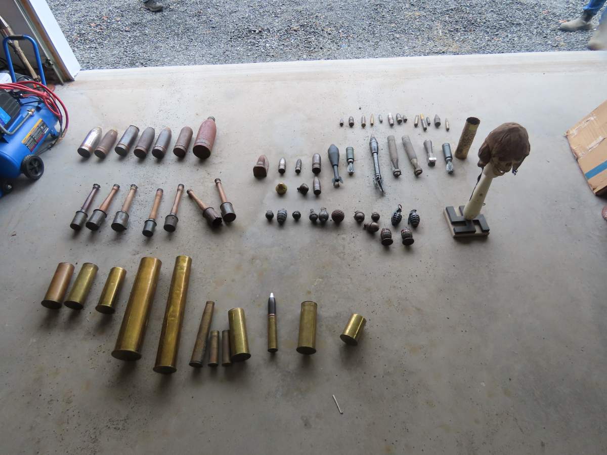 The seized items include stick grenades, mortar rounds, artillery shells, small arms ammunition and projectile fuses.