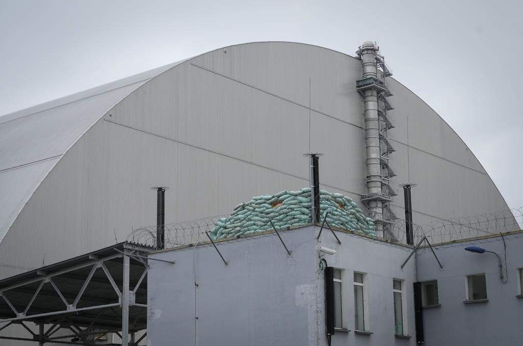 A Russian firing position near a shelter above the sarcophagus covering the exploded reactor at the Chornobyl nuclear power plant in Chornobyl, Ukraine, Saturday, April 16, 2022. (AP Photo/Efrem Lukatsky)