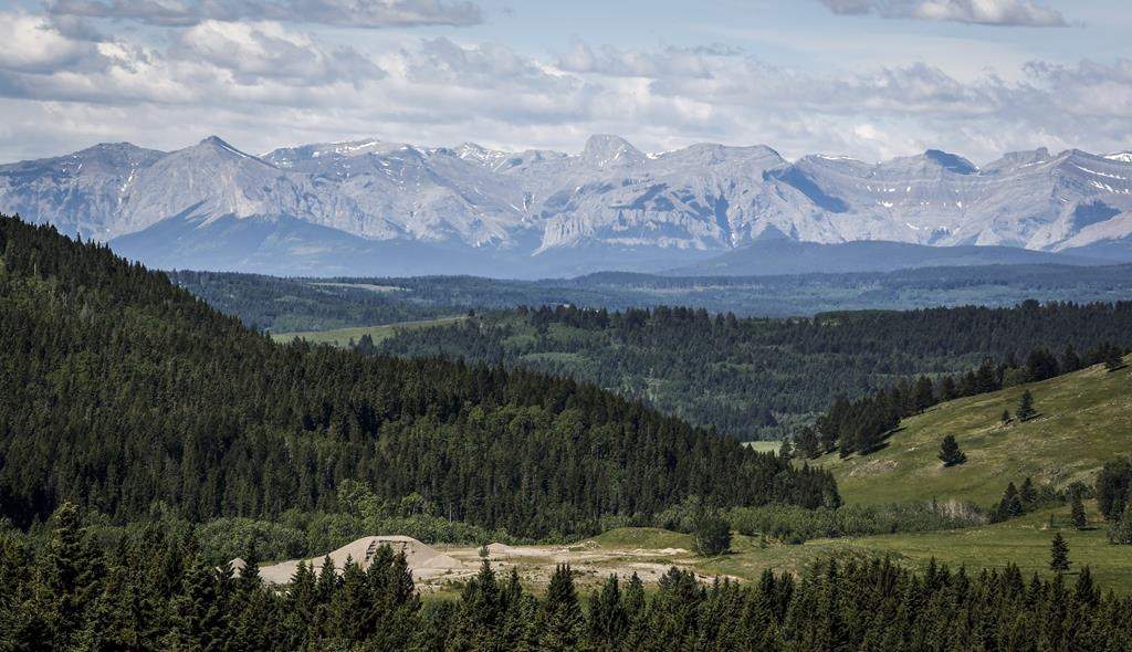 A section of the eastern slopes of the Canadian Rockies is seen west of Cochrane, Alta., Thursday, June 17, 2021. 