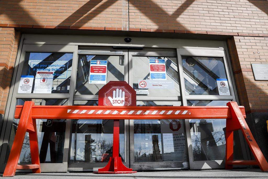 An entrance to the Peter Lougheed Centre hospital is shown in this file image in Calgary, Thursday, April 9, 2020. Alberta's upcoming review of its COVID-19 pandemic response is essential to better protect the public from future epidemics and pandemics, experts say. THE CANADIAN PRESS/Jeff McIntosh.