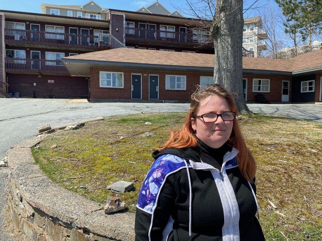 Brandy McGuire stands outside the Bluenose Inn & Suites in Halifax, Thursday, April 21, 2022.