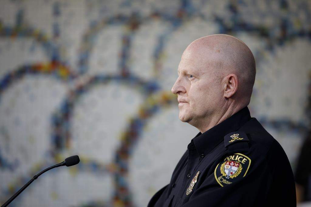 Ottawa interim police chief Steve Bell speaks to reporters during a press conference in Ottawa, Sunday, Feb. 20, 2022. Ottawa police promise a heavy presence in the capital and zero tolerance for hate as a second convoy prepares to descend on the city this weekend, this time involving hundreds of motorcycles instead of trucks.