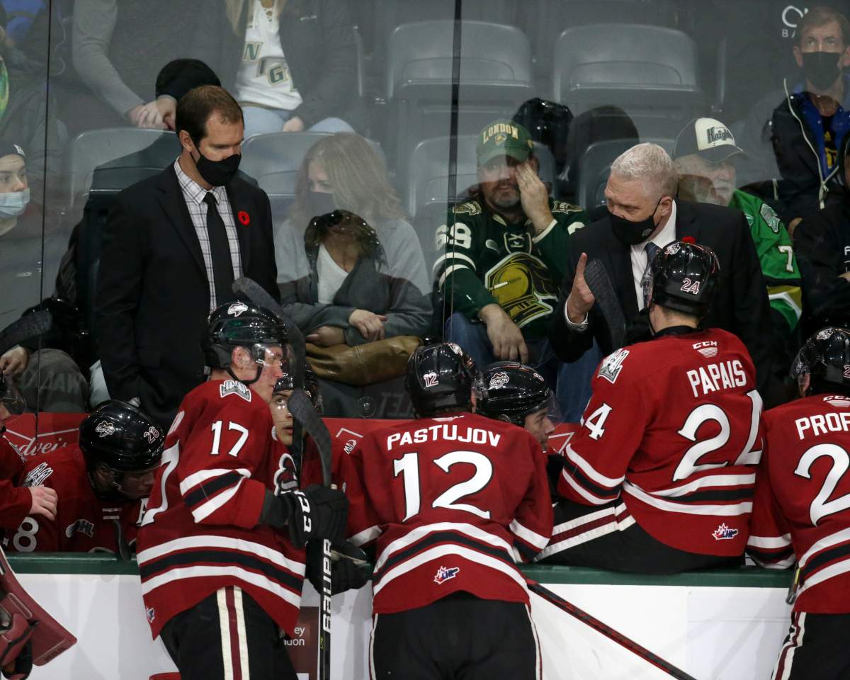 Guelp Storm players listen to head coach George Burnett
