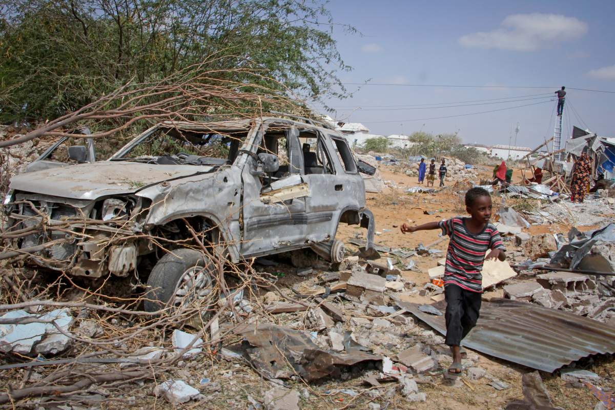 Wreckage on the outskirts of the Somali capital Mogadishu, Feb. 16, 2022. The attack by the al-Shabab extremist group killed five people and wounded 16, police said. (AP Photo/Farah Abdi Warsameh)