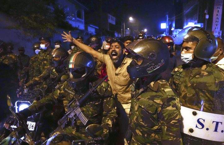 A Sri Lankan man shouts anti government slogans during a protest outside Sri Lankan president’s private residence on the outskirts of Colombo, Sri Lanka, Thursday, March 31, 2022.