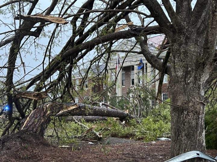 The Bryan County Courthouse was damaged and trees broken in half, Tuesday, April 5, 2022, after a storm passed through the city of Pembroke, Ga., 30 miles from Savannah, Ga.
