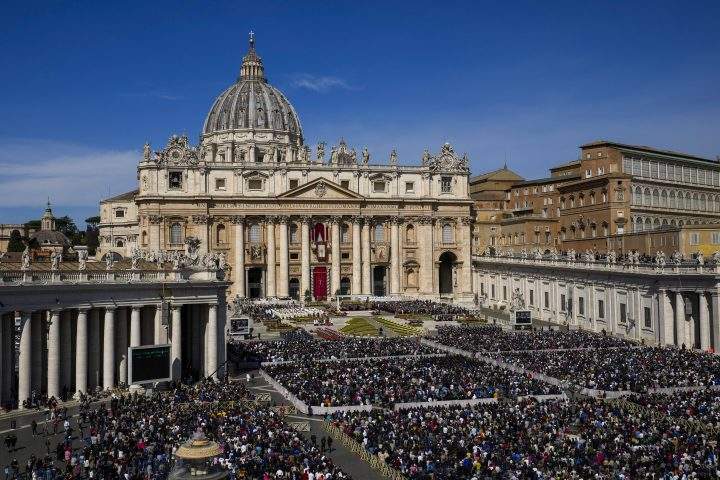 Faithful gather to attend the Catholic Easter Sunday mass led by Pope Francis in St. Peter’s Square at the Vatican, Sunday, April 17, 2022.