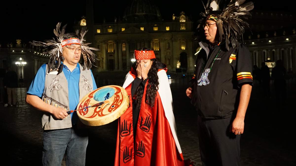 Lorelei Williams is given her sacred inheritance, the Indigenous name 'Palexelsiya,' in a spontaneous ceremony with Sts'ailes Chief Ralph Leon (right) and Coun. Kelsey Charlie outside Vatican City on Tues. March 29, 2022.